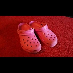 Pink crocs