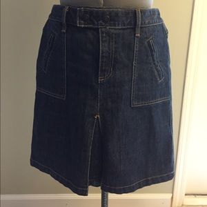 Knee length dark denim skirt.