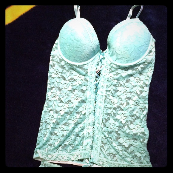 Beautiful turquoise corset and panty set.