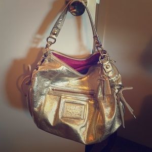 Metallic gold Coach purse