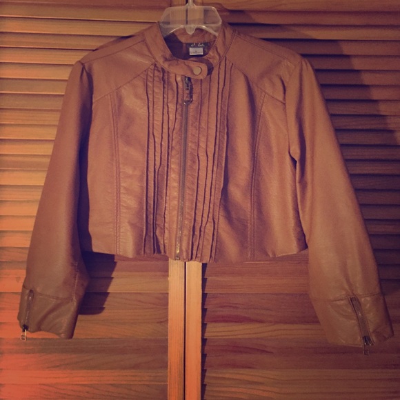 Camel leather half jacket.