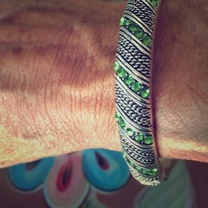 Bagel bracelet inlaid crystals green. , hinged