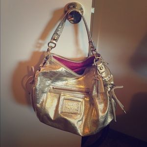 Metallic gold Poppy Coach purse!