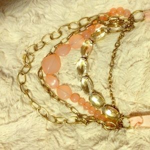 Long, adjustable pink and gold fashion necklace