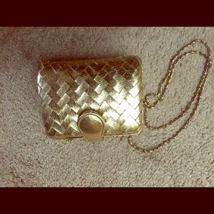 Gold vintage clutch purse.