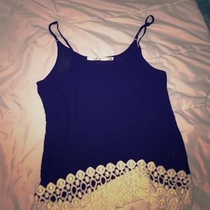 Navy tank with white lace edges