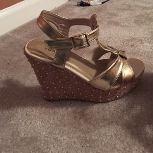 Size 8 gold wedges!