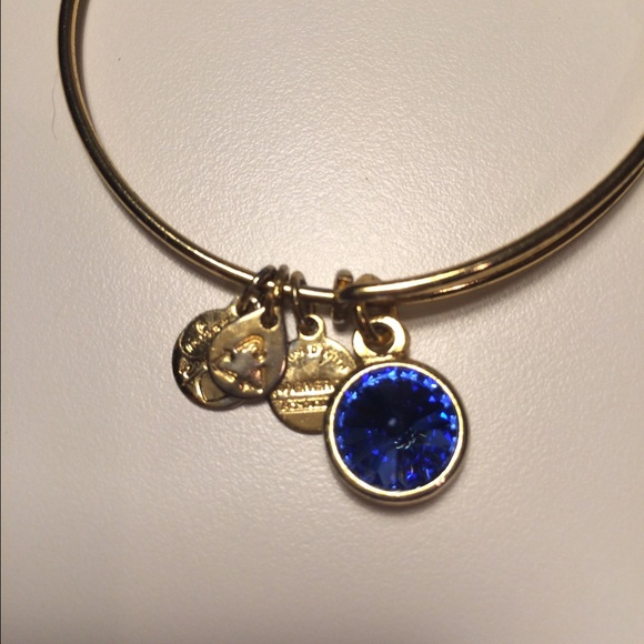Gold Alex & Ani bracelet with Sapphire charm