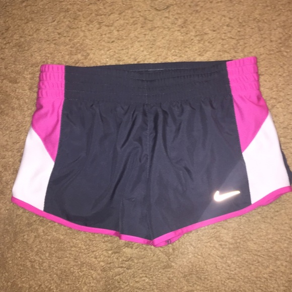 grey and pink Nike shorts