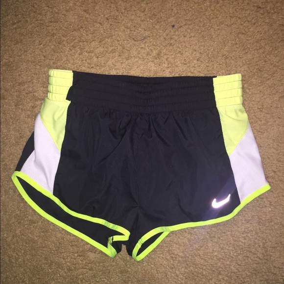 Black and neon yellow Nike shorts