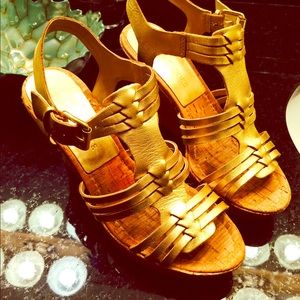 Gold shoes two inches