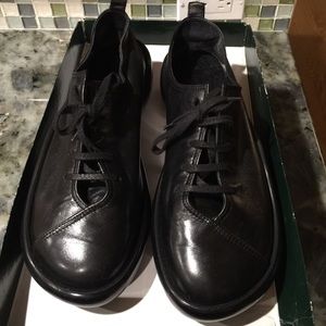 Black Robert Clergerie Sumo shoes in box with bag