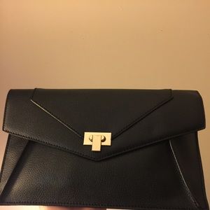 Melie Bianco clutch. Vegan leather. Never used.