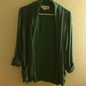 Turquoise open cardigan.