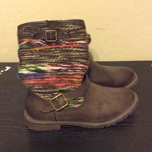 Brown colored striped boots
