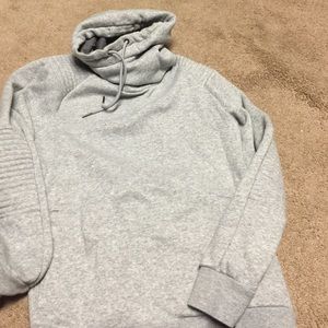 Grey turtleneck sweatshirt