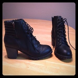 Black heeled lace-up booties