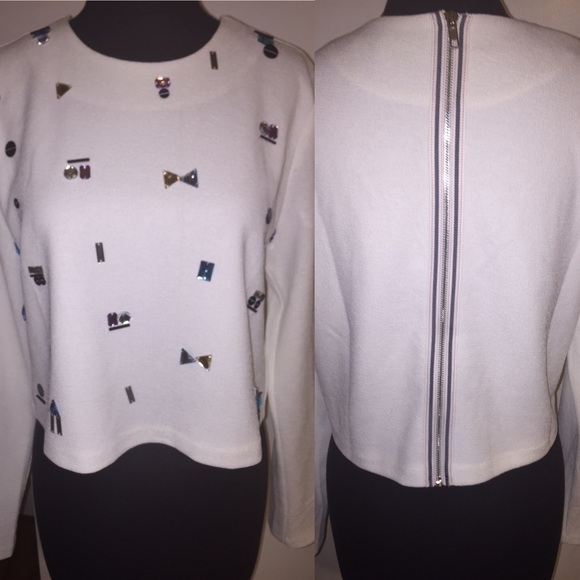 White sweater with crystal detailing