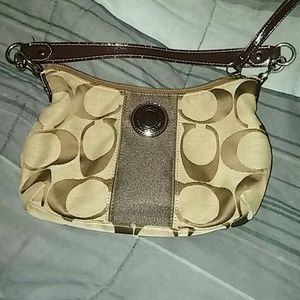 Brown coach purse.