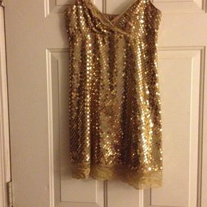 Gold Sequins tank top with lace trims.