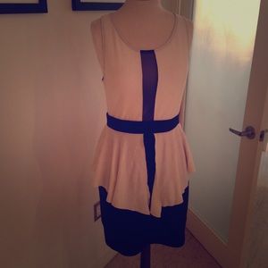 Black and white peplum dress with sheer accent