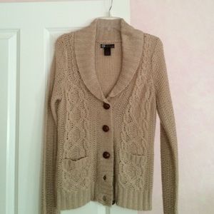 Tan cable-knit sweater