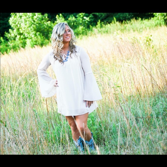 White dress with crocheted backless features
