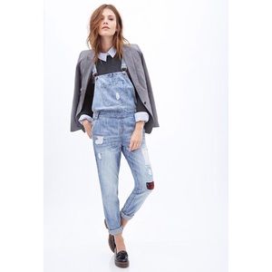 Denim overalls with plaid patch