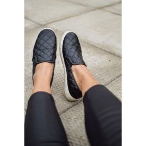 Quilted black leather slip-on sneakers
