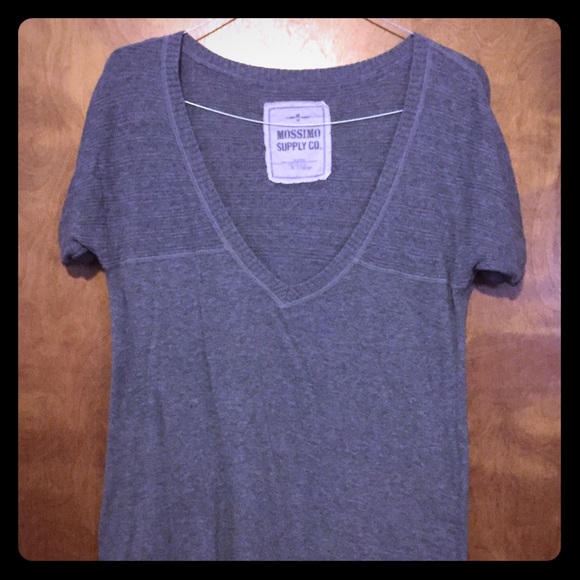 Hip length, short sleeve sweater