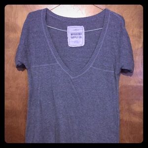 Hip length, short sleeve sweater