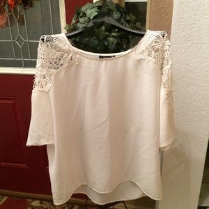 Cute a.n.a cream blouse with lace sleeves.