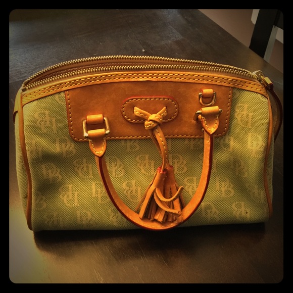 Dooney and Burke mini domed tassel satchel