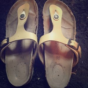 Pale yellow Birkenstocks