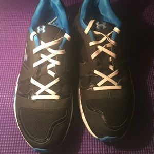 Black and Blue under Armour sneakers