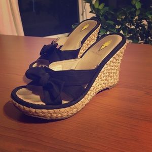 Black bow wedge sandals