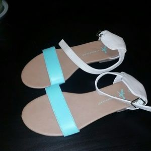 Nude and teal Moses style sandals