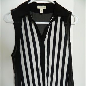 NWOT. White and black stripe sleeveless shirt. NWOT. White and black stripe sleeveless shirt.
