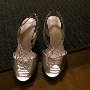 Caparros Silver 3/4 in. Heels.