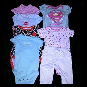 Assorted baby girl clothes 0-3 and 2 3-6 sizes.