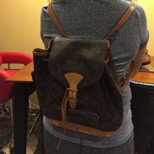 Vintage authentic Louis Vuitton back pack.