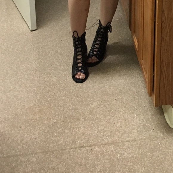 Lace up booties. Size 7