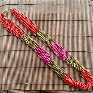 Long multi strand beaded necklace