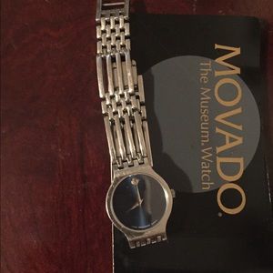 Movado blue face. Needs battery