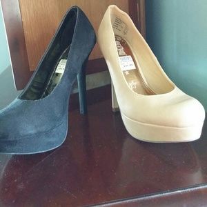 Tan and black platform shoes