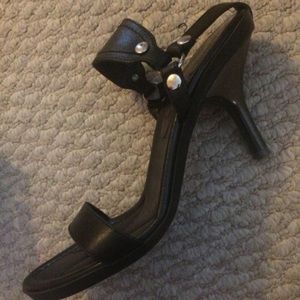 Black strappy Coach heels