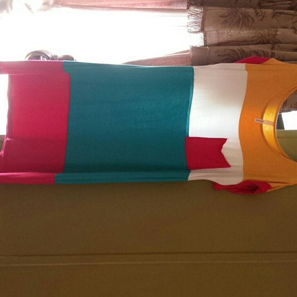 Brand new, never worn. From a boutique, wrong size