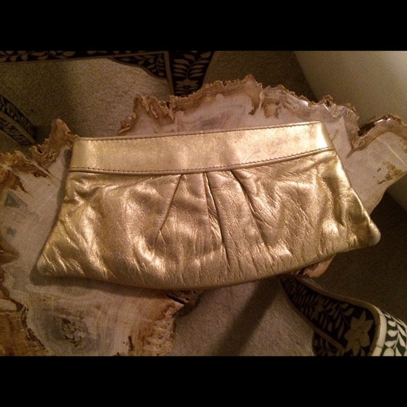 Metallic gold clutch