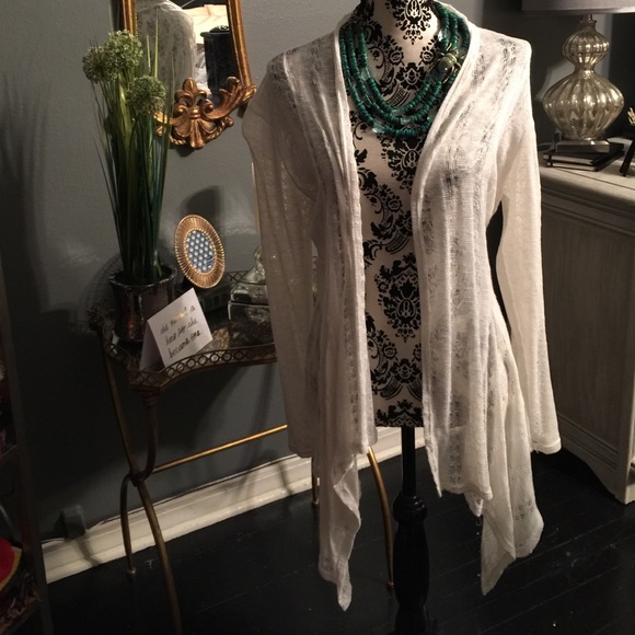 Asymmetrical white cover-up