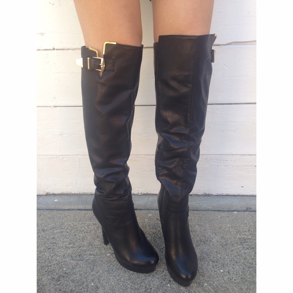 Black, over the knee, platform boots.